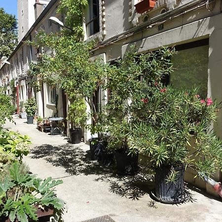 Cite Pilleux - Cozy Apartment In A Private Lane Paris Bagian luar foto