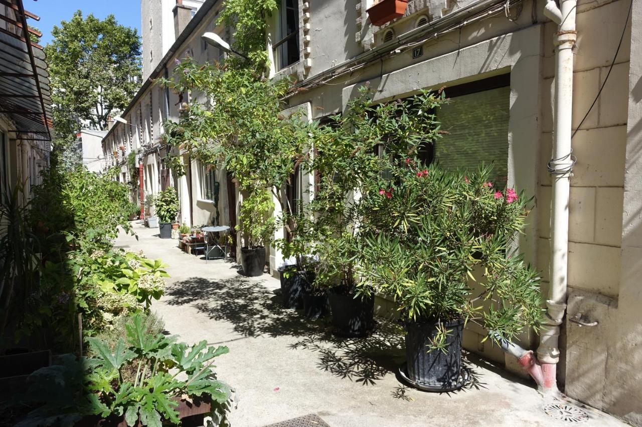 Cite Pilleux - Cozy Apartment In A Private Lane Paris Bagian luar foto